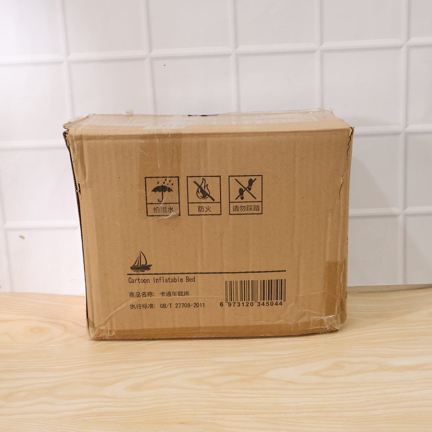 Brown box packaging cartoon inflatable bed