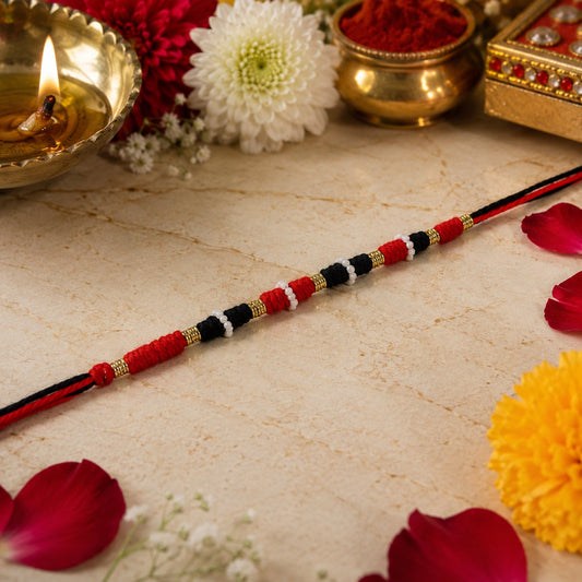 Red Black Thread Rakhi with White Beads 