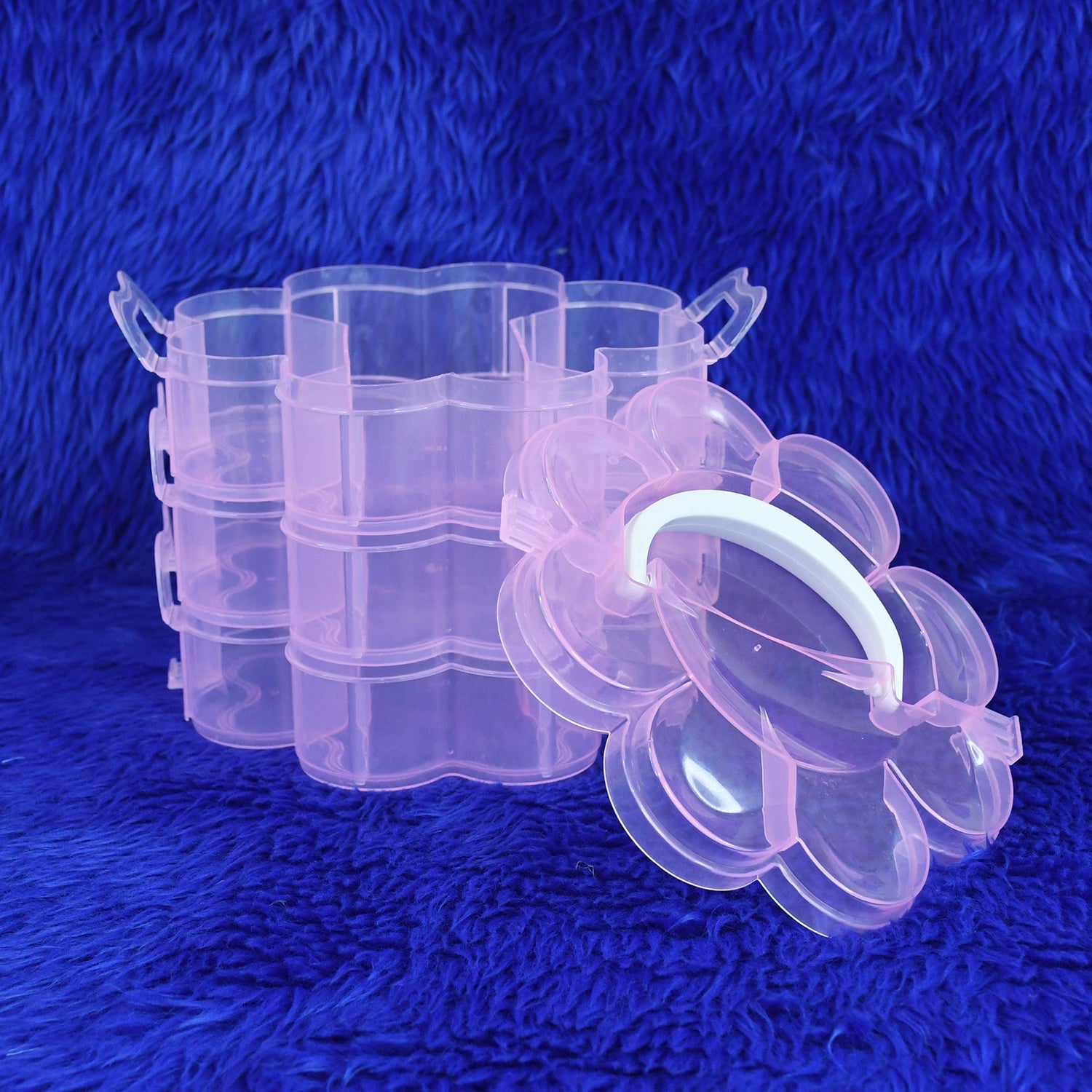 Flower-shaped storage box 3 layers open showing grid compartments India
