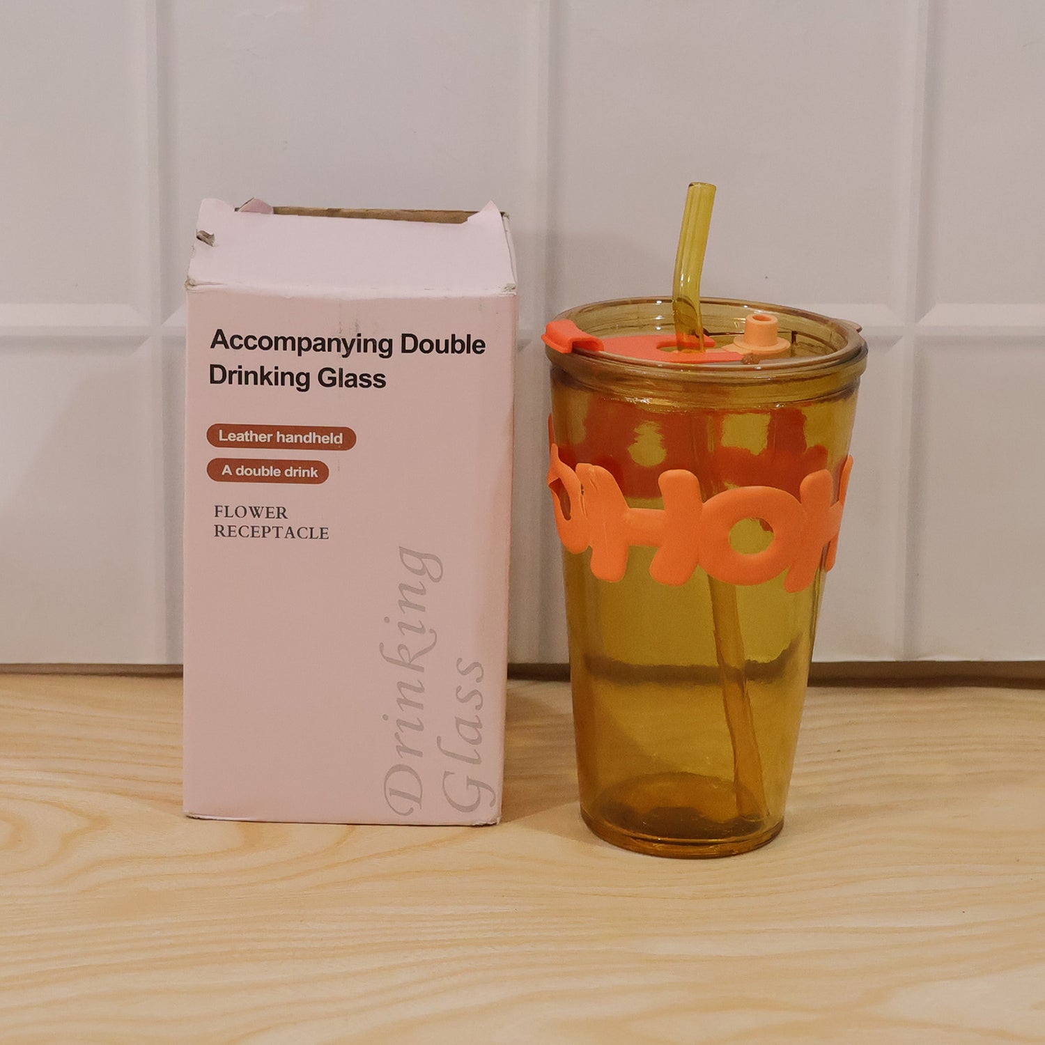 stylish glass tumbler with straw