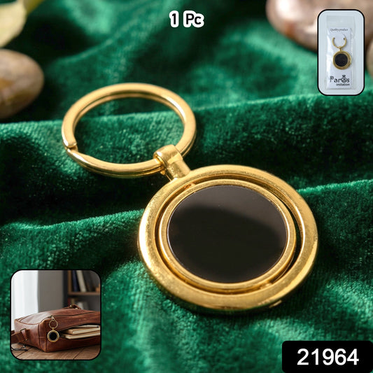 luxury gold keychain with rotating black pendant