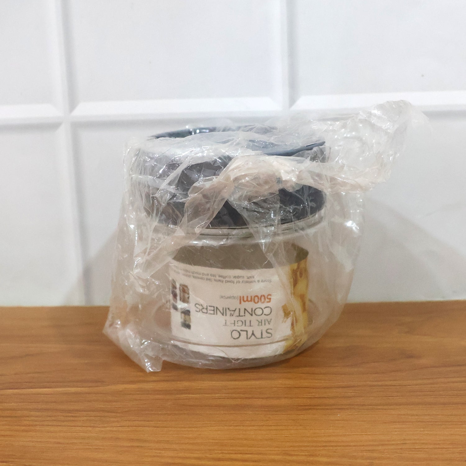 Clear kitchen container with tight-fitting lid