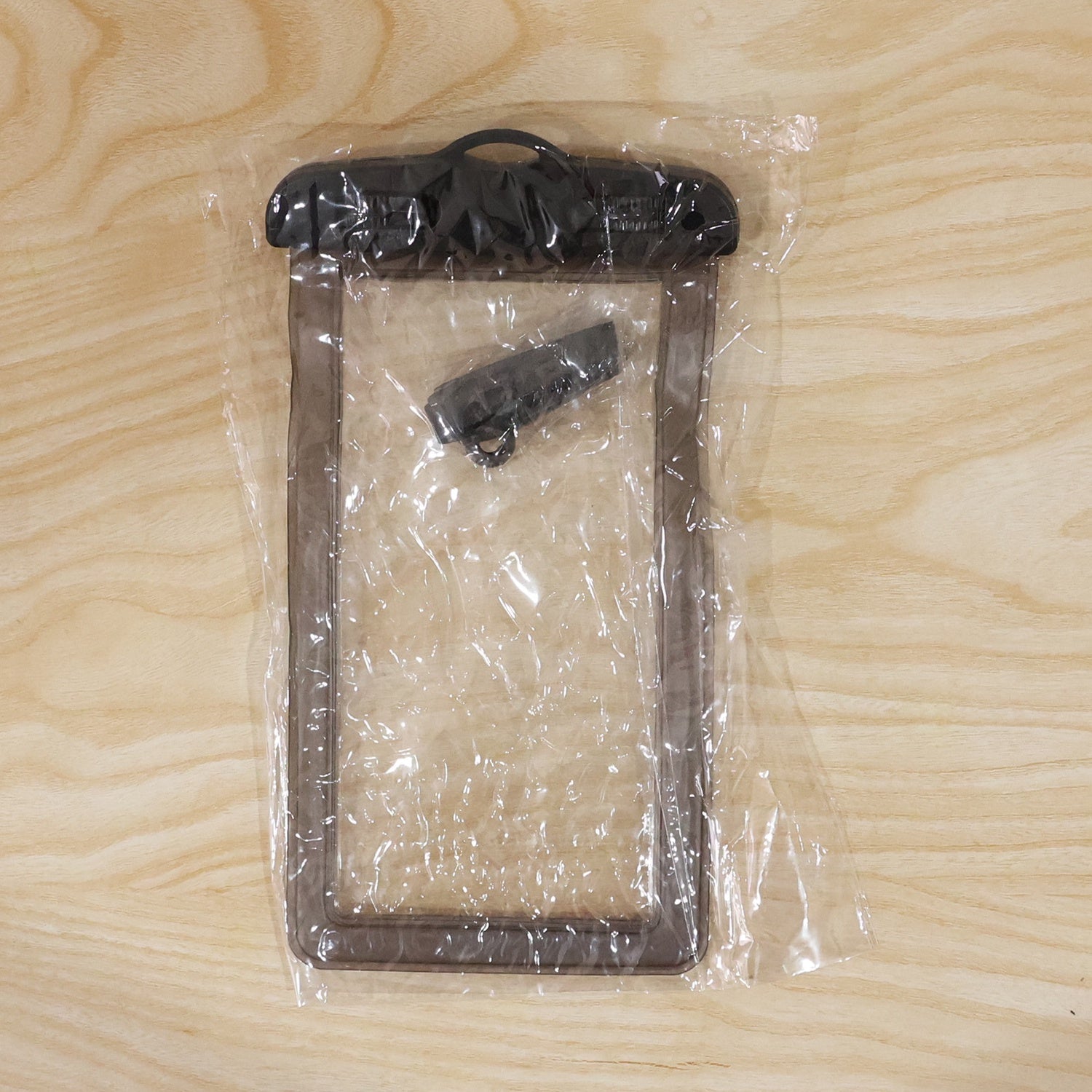 Black waterproof mobile pouch lifestyle shot