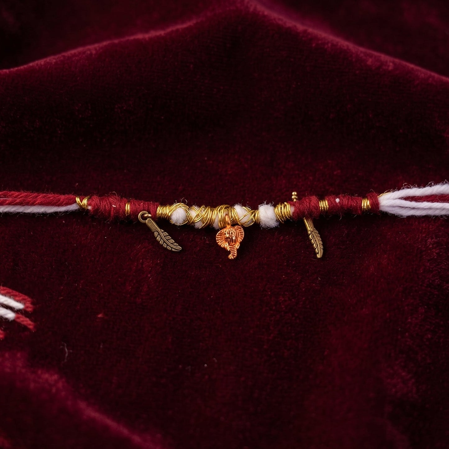 Traditional Ganesh Rakhi with Gold Wire 