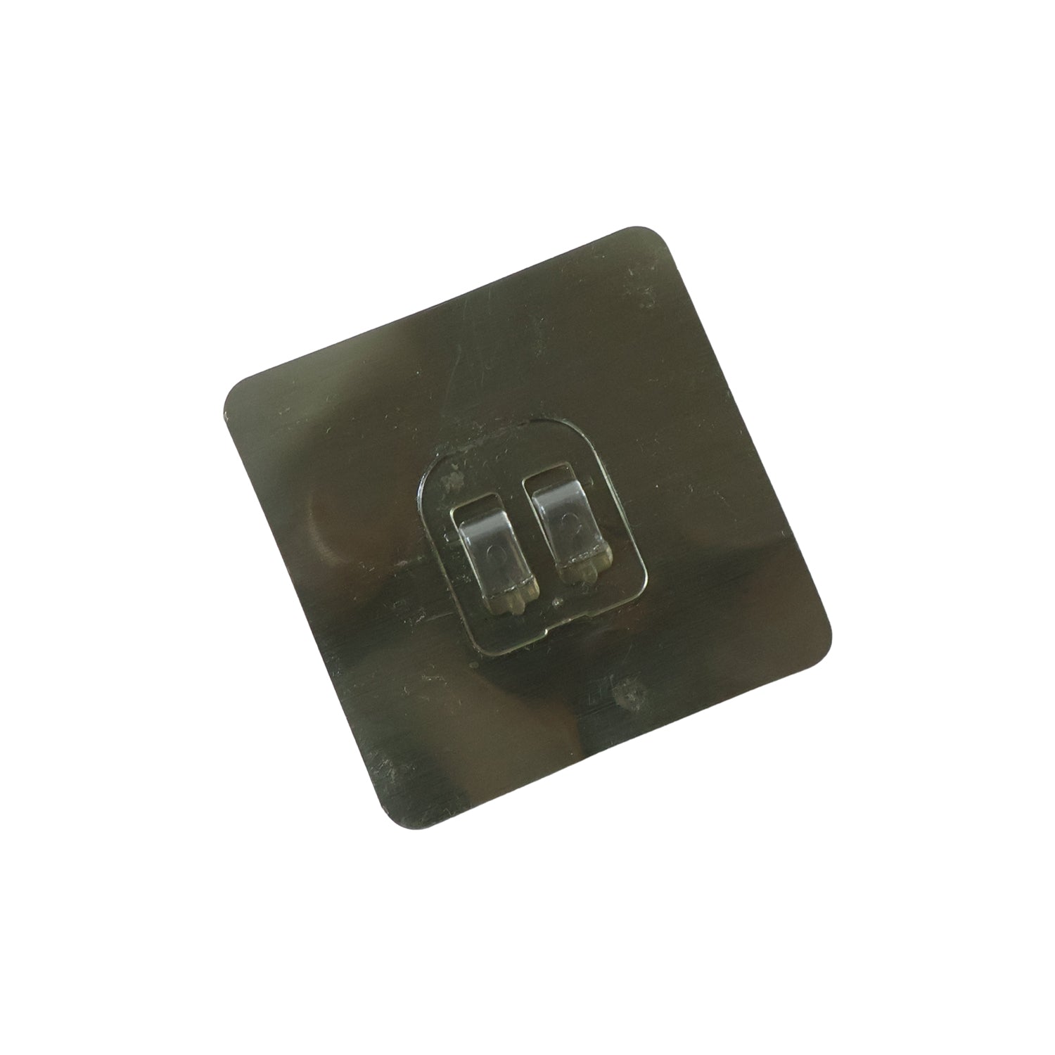 Transparent adhesive wall hook attached to glass surface